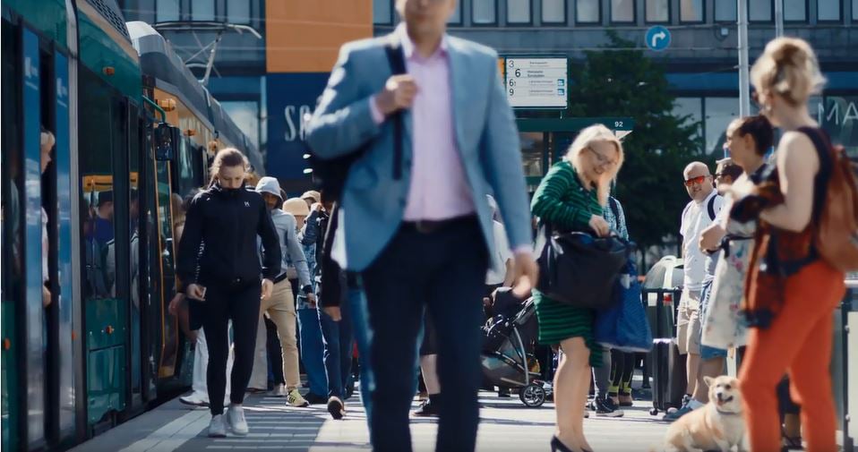 People walking on a busy train station in Finland